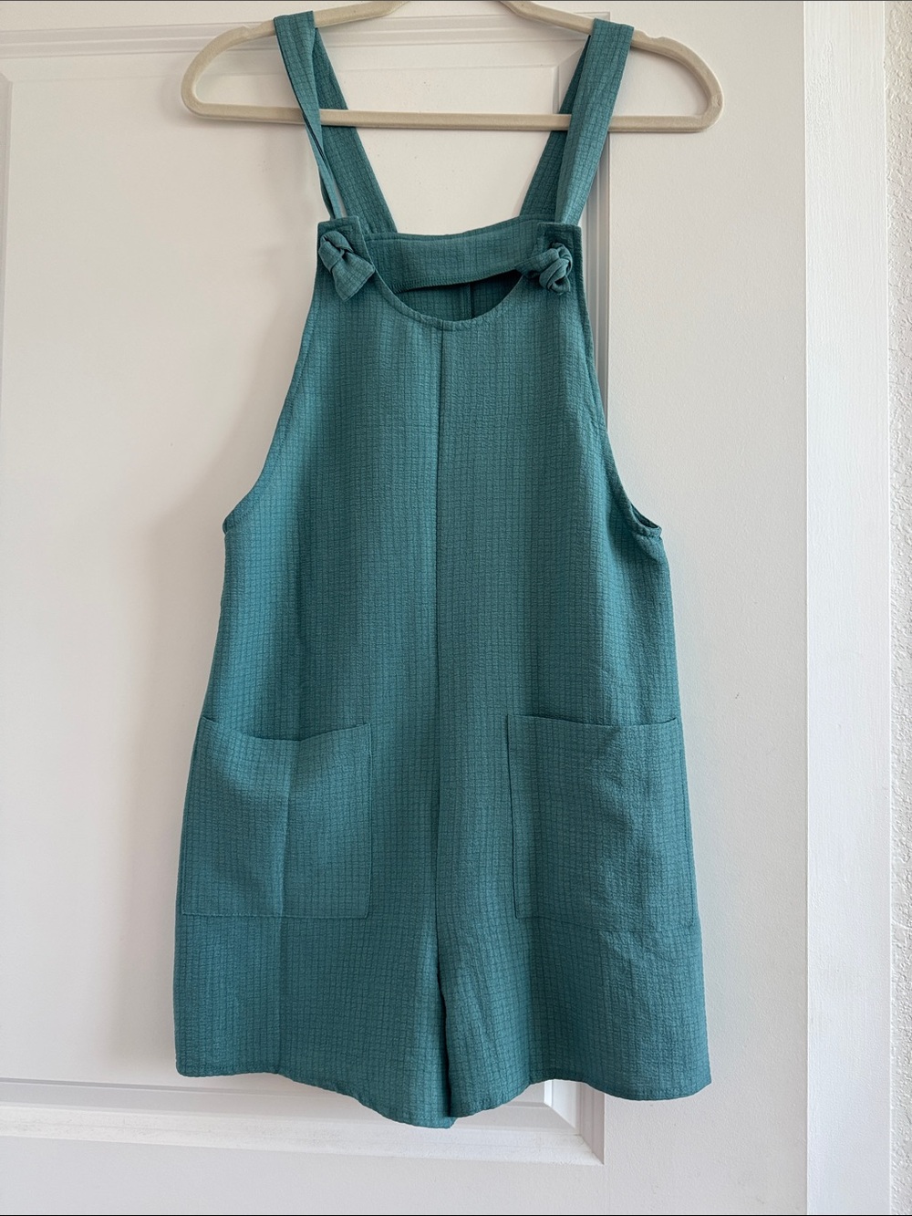 Teal Sleeveless Romper with Front Pockets